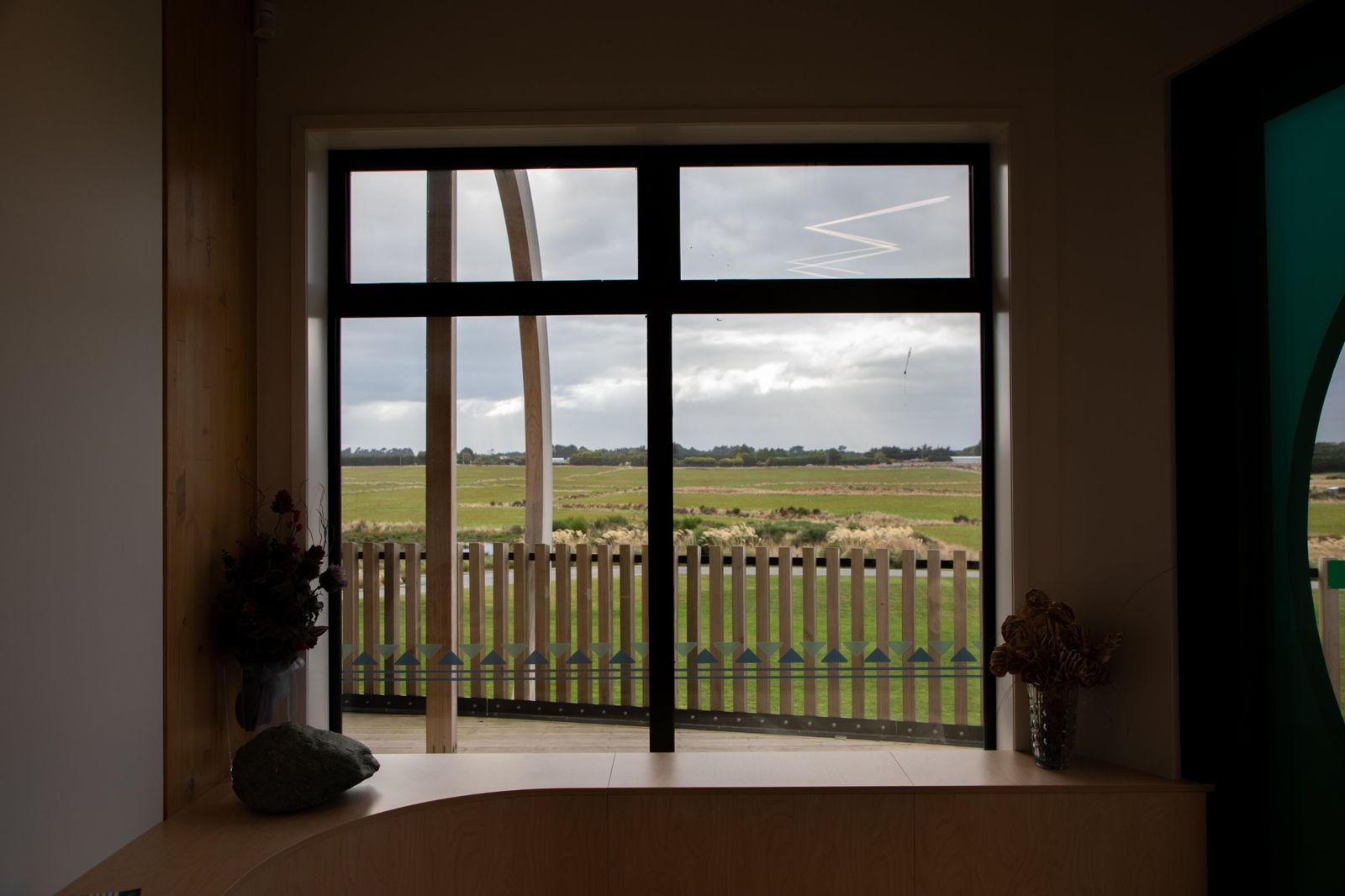 Looking out from the marae window over farmland